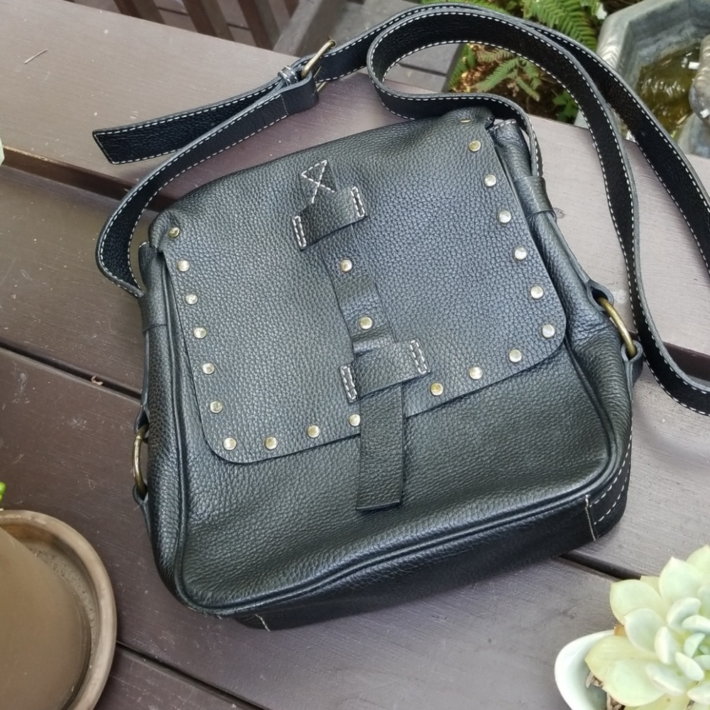 Excellent studded leather bag. Made in Korea! So D